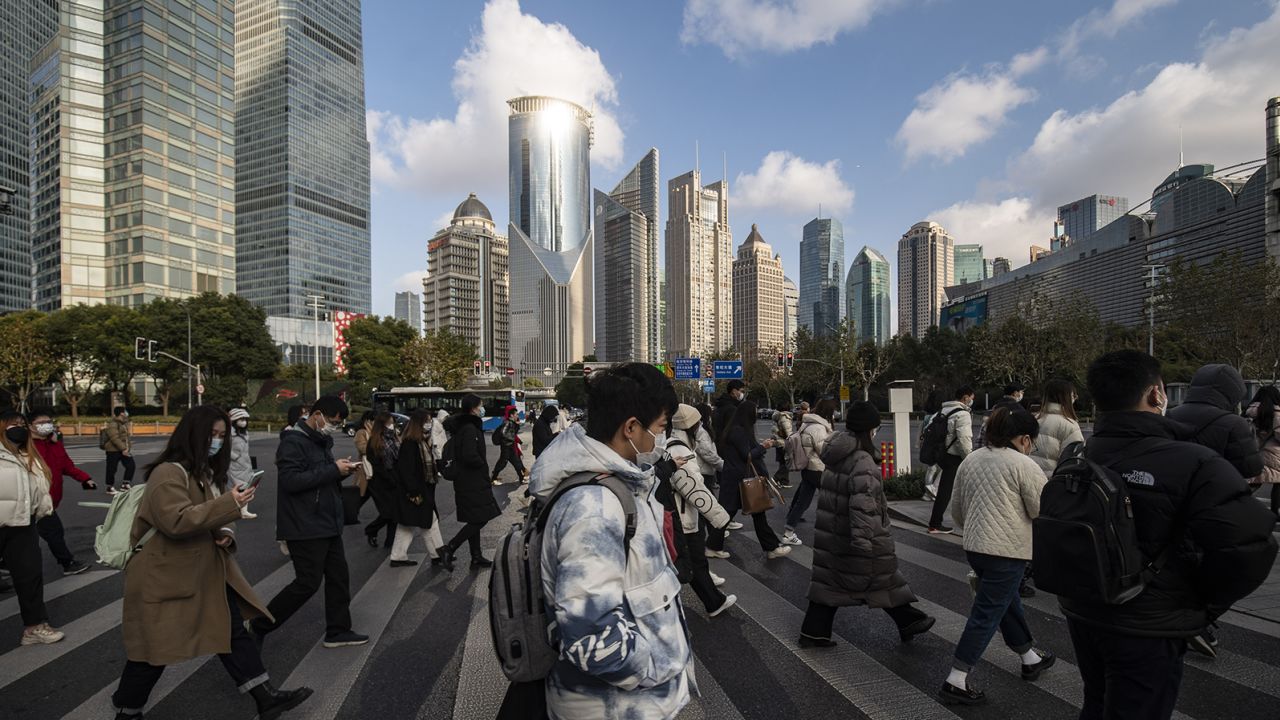Pedestrians in Pudong's Lujiazui Financial District in Shanghai in January 2023. 