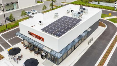 The exterior of a new Chipotle has solar panels.